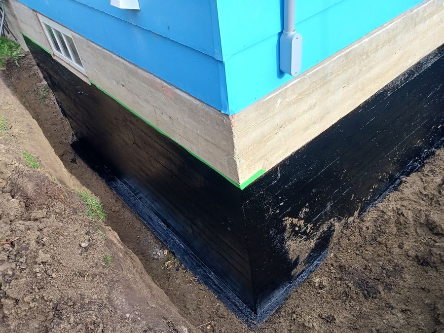 Waterproofed foundation after coating